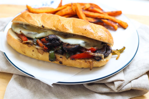 Hearty portabella mushrooms are the star of this vegetarian Philly cheesesteak sandwich recipe!  It's an easy vegetarian lunch or dinner the whole family will enjoy!