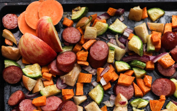 This easy sheet pan dinner made with turkey sausage, sweet potatoes, apples, and zucchini is the perfect quick weeknight fall-inspired healthy dinner recipe!
