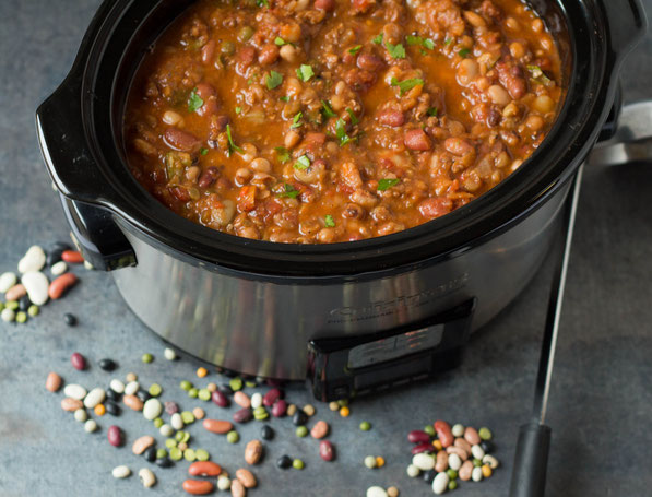 This hearty slow cooker sixteen bean and sausage soup recipe is the perfect healthy make-ahead lunch or dinner for a busy week!