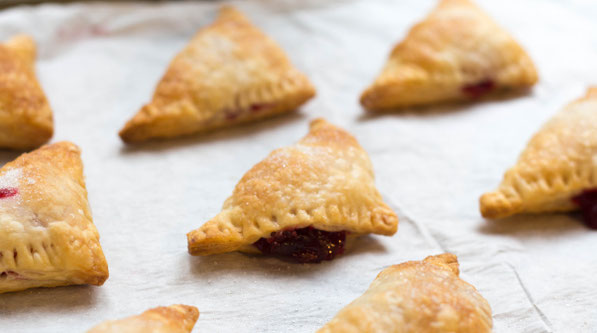 These mini cranberry-orange turnovers are a festive and flavorful dessert for holiday gatherings! 