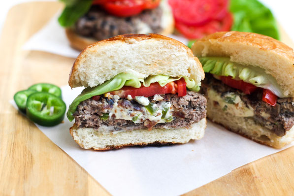 This lighter jalapeno popper-stuffed burger recipe made with diced mushrooms and beef is flavorful, juicy, and perfect for a weeknight dinner or family barbecue!