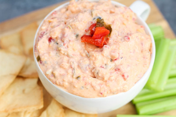 This easy pimento cheese recipe has only five main ingredients, is packed with flavor, and is made with no mayo, making it much lighter than traditional pimento cheese!