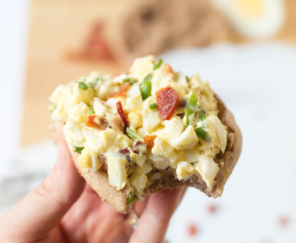 This lighter egg salad recipe packs a ton of flavor and texture with the addition of bacon and green onions.  It's a great healthy breakfast or lunch option! 