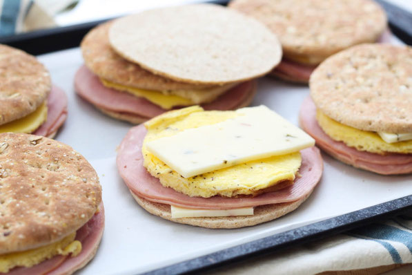 Weekday mornings just got a little more delicious with these easy (plus healthy) make-ahead freezer ham and egg sandwiches with pepper jack cheese...The perfect fast and high protein breakfast recipe!