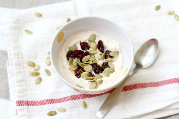Pumpkin spiced yogurt is a delicious way to "fall-up" your breakfast or snack routine! And the sweet and crunchy additions of cherries and pumpkin seeds go perfectly in this tasty (and super easy) recipe!