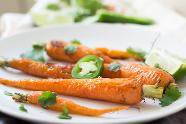 Jalapeno-lime honey glazed carrots are the perfect spring veggie side dish! 