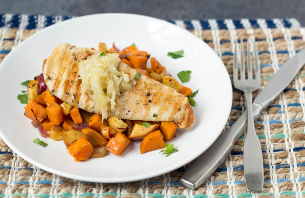 Roasted sweet potatoes, apple, and onion complement this marinated orange-maple chicken perfectly.  Serve with raw sauerkraut for a boost of nutrition and probiotics for this healthy dinner! 