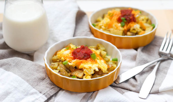 These easy and affordable potato, egg, and cheese breakfast bowls are a healthy, gluten free, and freezer-friendly recipe that costs around $0.52 per serving!