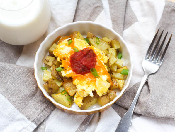 These easy and affordable potato, egg, and cheese breakfast bowls are a healthy, gluten free, and freezer-friendly recipe that costs around $0.52 per serving!