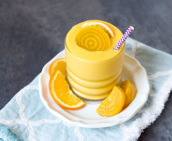 This gorgeous golden beet and mango smoothie is a fun, bright (plus healthy) way to start the day!  It's the perfect healthy breakfast recipe! 