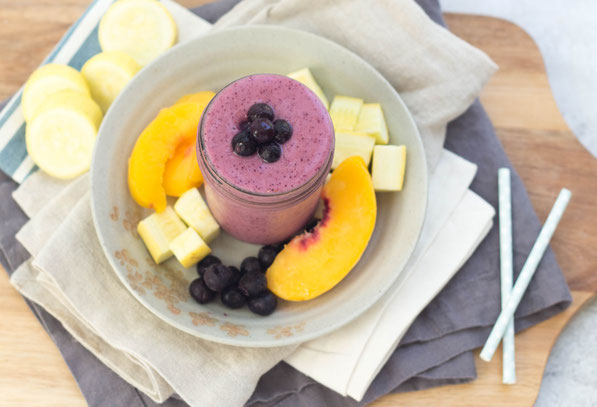 Yellow squash blends into this blueberry-peach smoothie beautifully! This smoothie is a healthy, creamy, gluten free, vegetarian breakfast option that's so refreshing in these hot summer months! 