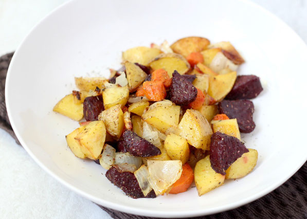 This beautiful medley of roasted beets, potatoes, and carrots with garlic-thyme seasoning makes for one delicious side dish!