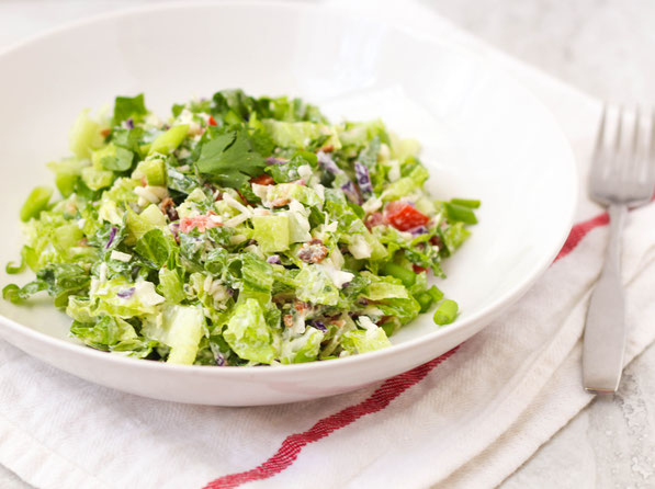 This chopped salad is lighter than most chopped salad recipes, but still has a few "treats" making it a fun and delicious way to enjoy those veggies! 