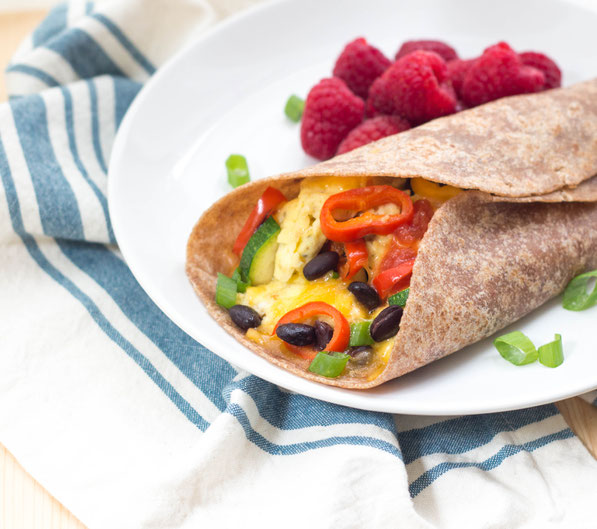 These easy egg burritos with sweet peppers, zucchini, and black beans are the perfect  protein-packed, flavorful, and fun healthy breakfast-on-the go!  #AD