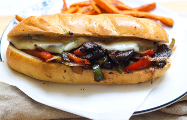 Hearty portabella mushrooms are the star of this vegetarian Philly cheesesteak sandwich recipe!  It's an easy vegetarian lunch or dinner the whole family will enjoy!