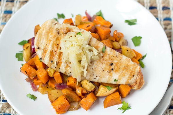 Roasted sweet potatoes, apple, and onion complement this marinated orange-maple chicken perfectly.  Serve with raw sauerkraut for a boost of nutrition and probiotics for this healthy dinner! 