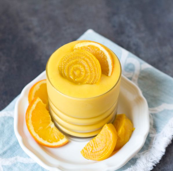 This gorgeous golden beet and mango smoothie is a fun, bright (plus healthy) way to start the day!  It's the perfect healthy breakfast recipe! 