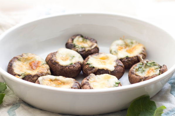 These easy spinach and mozzarella stuffed mushrooms are the perfect healthy appetizer or side dish! 