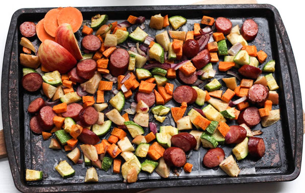 This easy sheet pan dinner made with turkey sausage, sweet potatoes, apples, and zucchini is the perfect quick weeknight fall-inspired healthy dinner recipe!