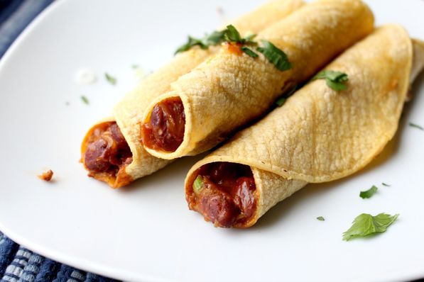 These baked vegetarian chili cheese taquitos are the perfect quick healthy weeknight dinner recipe! They're ready in about 20 minutes and are very family friendly!
