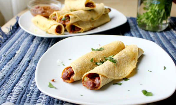 These baked vegetarian chili cheese taquitos are the perfect quick healthy weeknight dinner recipe!  They're ready in about 20 minutes and are very family friendly! 