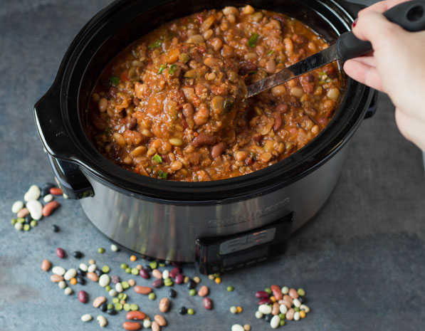 This hearty slow cooker sixteen bean and sausage soup recipe is the perfect healthy make-ahead lunch or dinner for a busy week! 