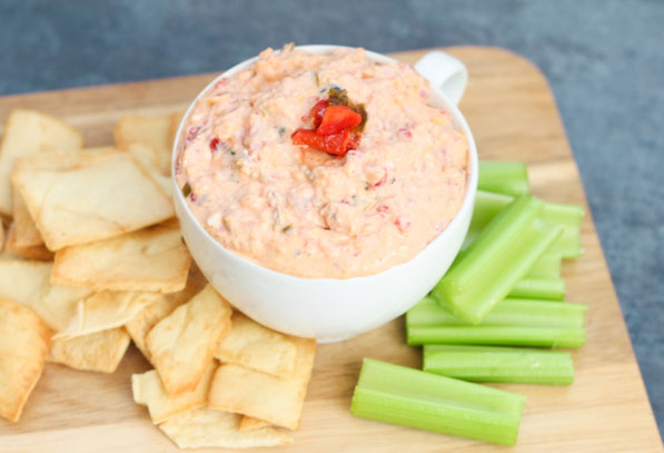 This easy pimento cheese recipe has only five main ingredients, is packed with flavor, and is made with no mayo, making it much lighter than traditional pimento cheese!