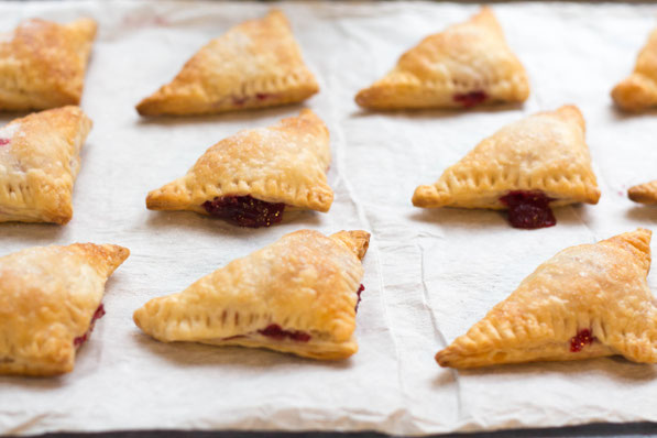 These mini cranberry-orange turnovers are a festive and flavorful dessert for holiday gatherings!