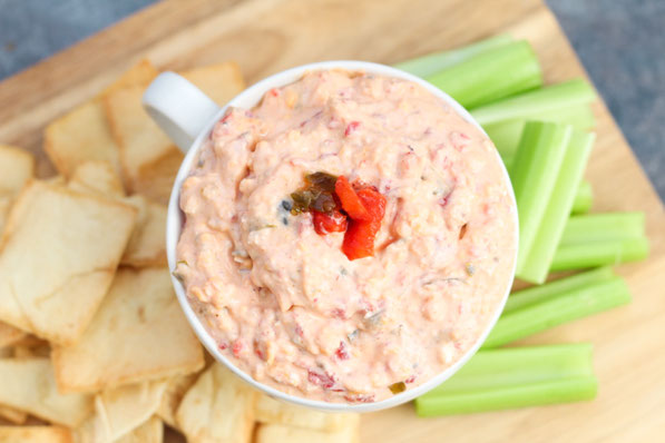 This easy pimento cheese recipe has only five main ingredients, is packed with flavor, and is made with no mayo, making it much lighter than traditional pimento cheese!