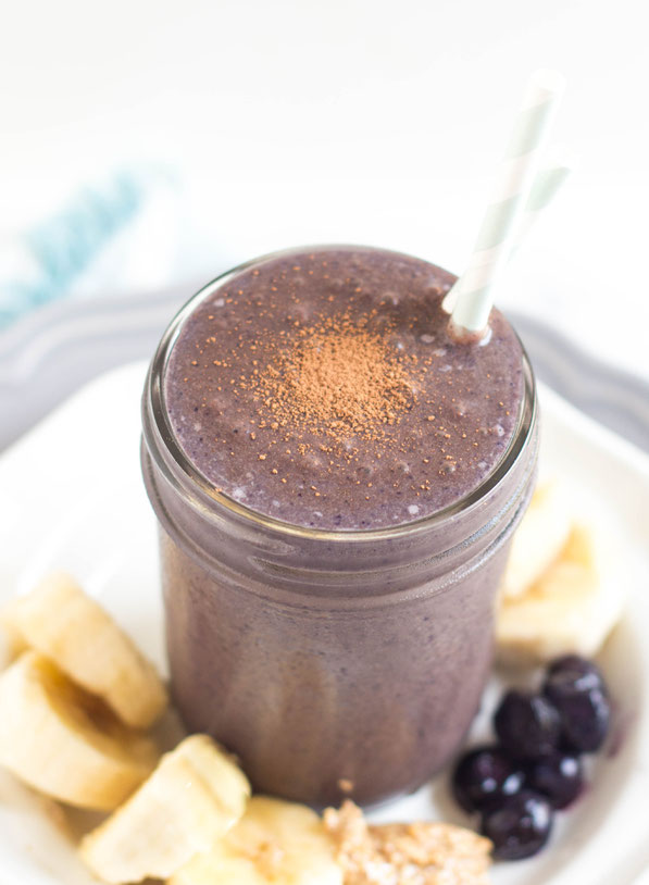 Blueberries, cocoa powder, bananas, and almond butter give this smoothie a rich creamy texture and beautiful flavor.  This sweet refreshing smoothie is a great gluten free, vegetarian breakfast recipe! 