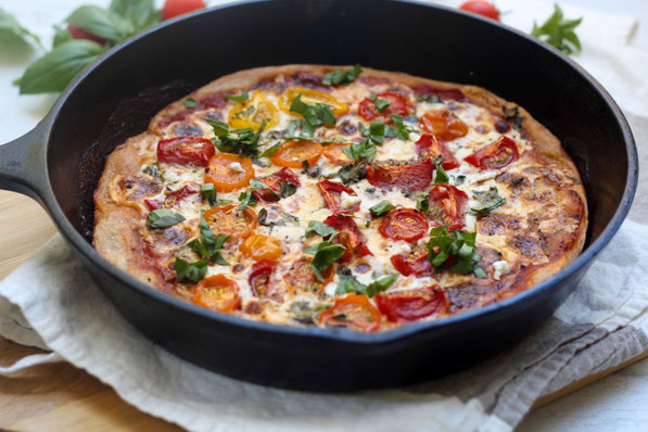 This light and healthy tomato and cheese skillet pizza is the perfect family-friendly vegetarian dinner recipe! 