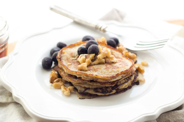 These easy gluten-free blueberry walnut banana pancakes are a healthy, high-protein (and tasty) breakfast recipe!