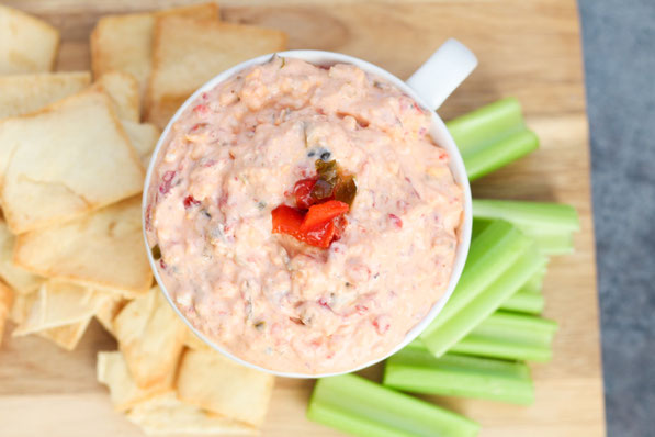 This easy pimento cheese recipe has only five main ingredients, is packed with flavor, and is made with no mayo, making it much lighter than traditional pimento cheese!