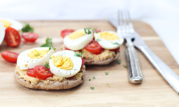 This tasty twist on an egg sandwich is a flavorful and filling way to start the day!  Eggs, hummus, and a whole grain English muffin are the base of this quick, high protein breakfast recipe!  
