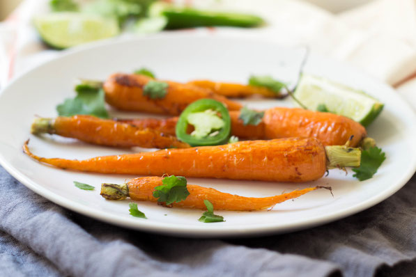 These gorgeous honey glazed carrots with lime and jalapenos are the perfect fresh spring side dish! 