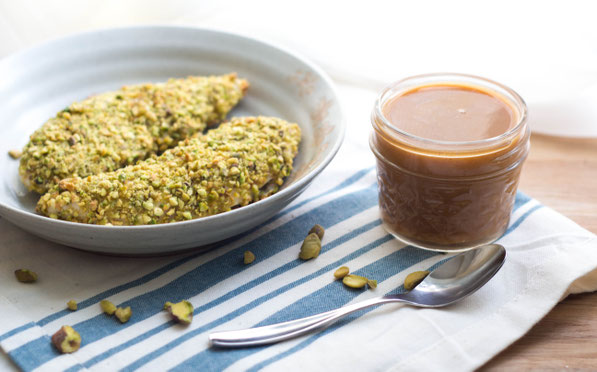 These healthy pistachio-crusted chicken tenders come together in just a few minutes, and the homemade BBQ honey-mustard dipping sauce is the perfect fun addition to this tasty meal!These healthy pistachio-crusted chicken tenders come together in just a fe