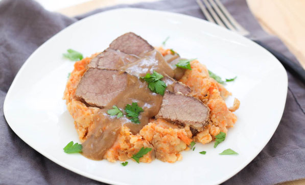 This slow cooker beef brisket with mashed potatoes, carrots, and onions is a beautiful family-friendly comfort dish!  It's a classic recipe made a little lighter and takes only a few minutes to prep! 