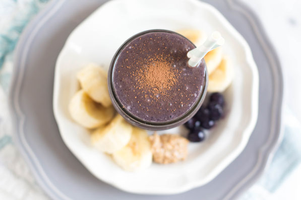 Blueberries, cocoa powder, bananas, and almond butter give this smoothie a rich creamy texture and beautiful flavor.  This sweet refreshing smoothie is a great gluten free, vegetarian breakfast recipe! 