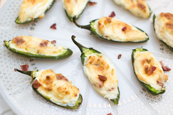 These lighter bacon cream cheese stuffed jalapeno poppers are the best appetizer recipe!  Everyone will love them and no one will notice they're a healthier snack option! 