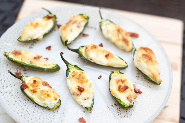 These lighter bacon cream cheese stuffed jalapeno poppers are the best appetizer recipe!  Everyone will love them and no one will notice they're a healthier snack option! 