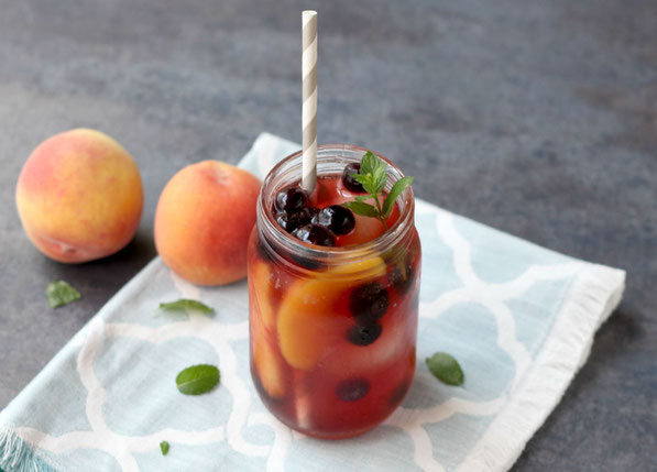 healthy sweet iced tea with peaches and blueberries!