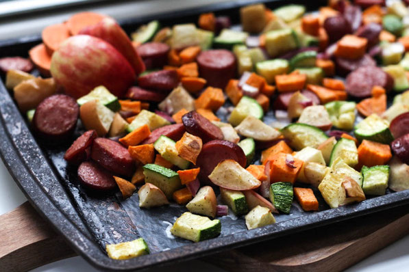 This easy sheet pan dinner made with turkey sausage, sweet potatoes, apples, and zucchini is the perfect quick weeknight fall-inspired healthy dinner recipe!