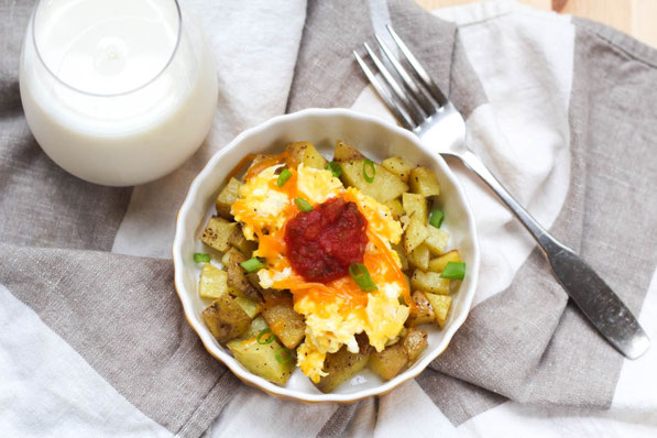These easy and affordable potato, egg, and cheese breakfast bowls are a healthy, gluten free, and freezer-friendly recipe that costs around $0.52 per serving!