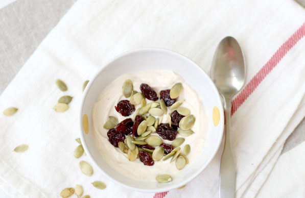 Pumpkin spiced yogurt is a delicious way to "fall-up" your breakfast or snack routine!  And the sweet and crunchy additions of cherries and pumpkin seeds go perfectly in this tasty (and super easy) recipe!