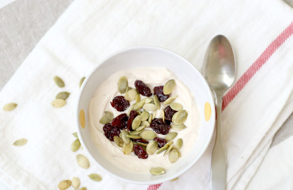 Pumpkin spiced yogurt is a delicious way to "fall-up" your breakfast or snack routine!  And the sweet and crunchy additions of cherries and pumpkin seeds go perfectly in this tasty (and super easy) recipe!