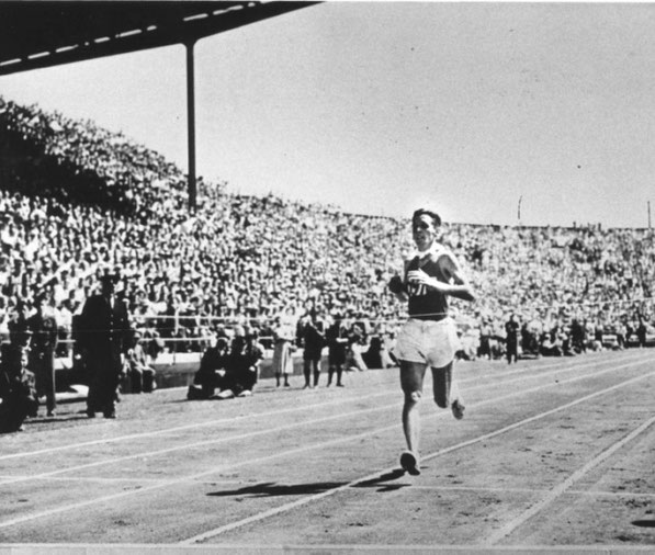 Joe McGhee wins the Empire Games marathon in Vancouver only a couple of months after Scottish title success