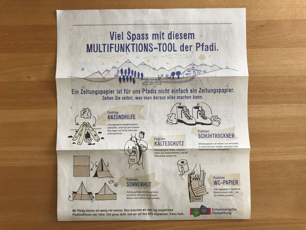 Ein Multifunktions-Tool auf Zeitungspapier. In der Pfadi findet es vielfältigen Einsatz und spricht die Abenteurer der jungen Generation (und ihre Eltern, die sich auf freie Samstagnachmittage freuen) spielerisch an.
