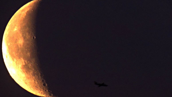 The Moon and the Plane
