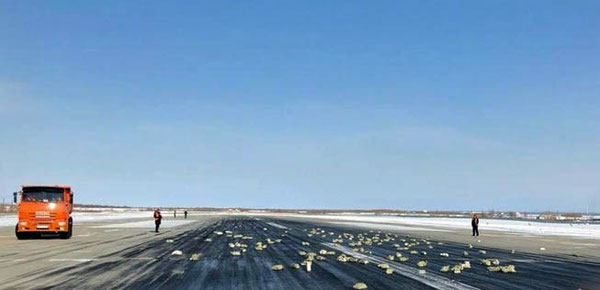 A rare image – Yakutsk’s runway paved with gold bars 