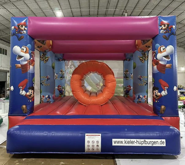 Bouncer mit Dach Springburg Hüpfkissen SuperMario Bounce Haus in Kiel mieten 